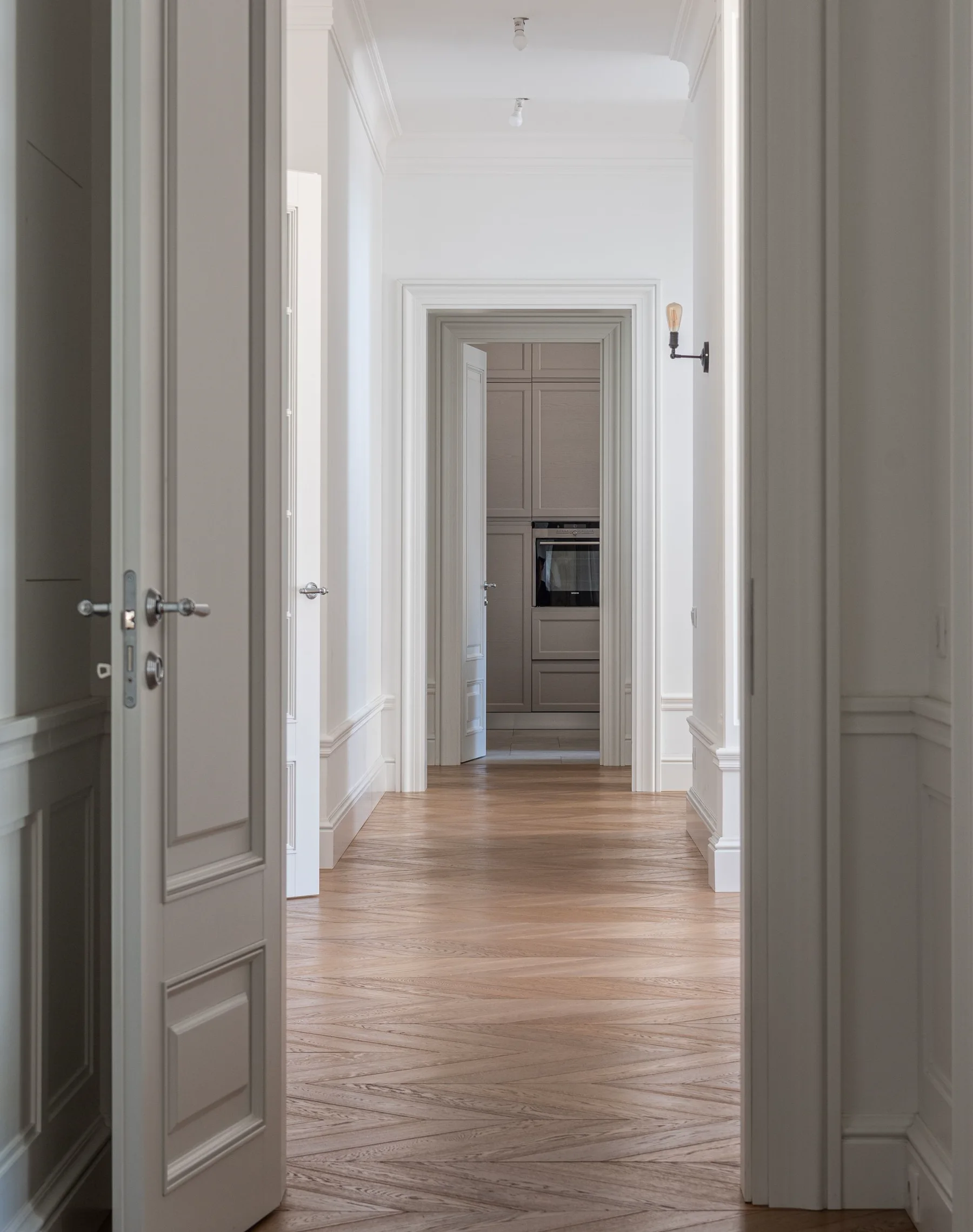 Warm wood floor finishing around fitted interiors